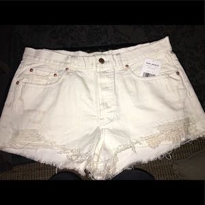 NWT FREE PEOPLE WHITE CUT OFF SHORTS SIZE 31/10